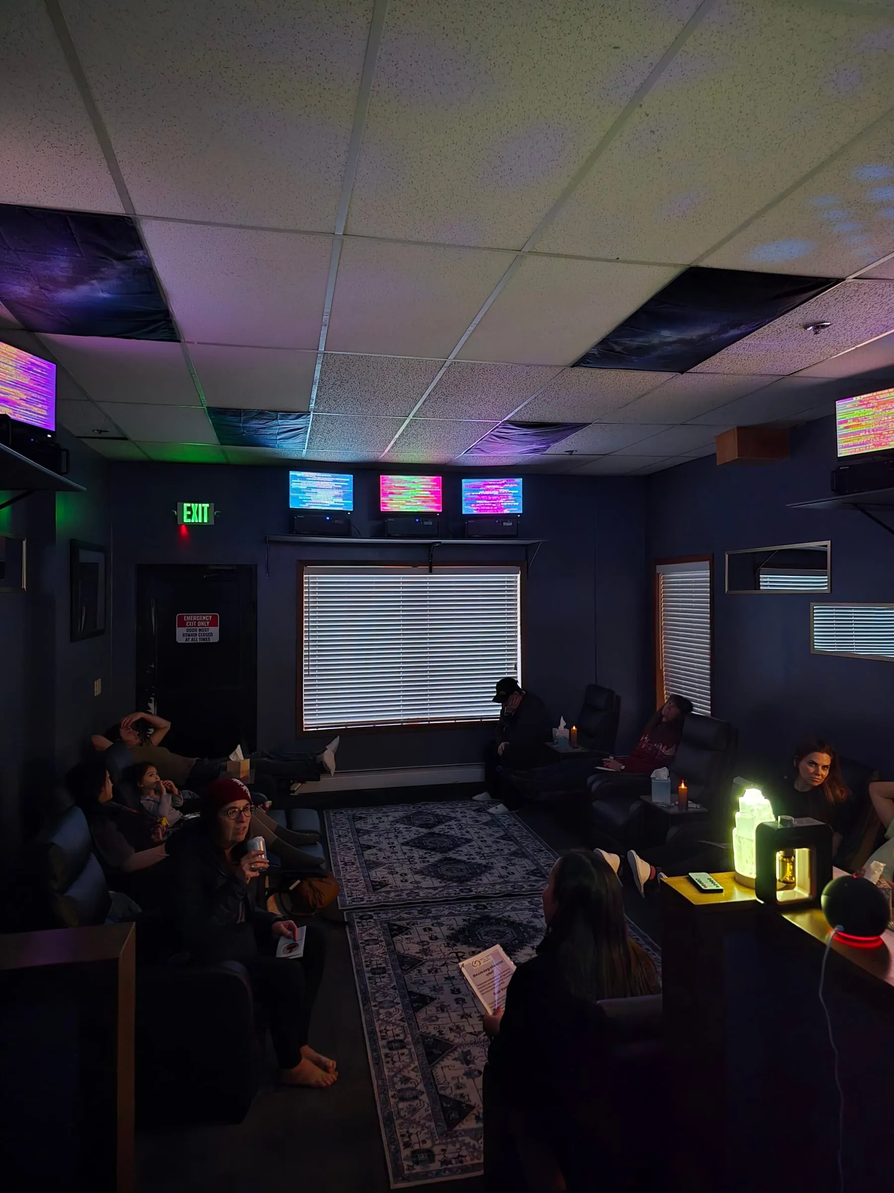 The Energy Enhancement Room lit by its screens