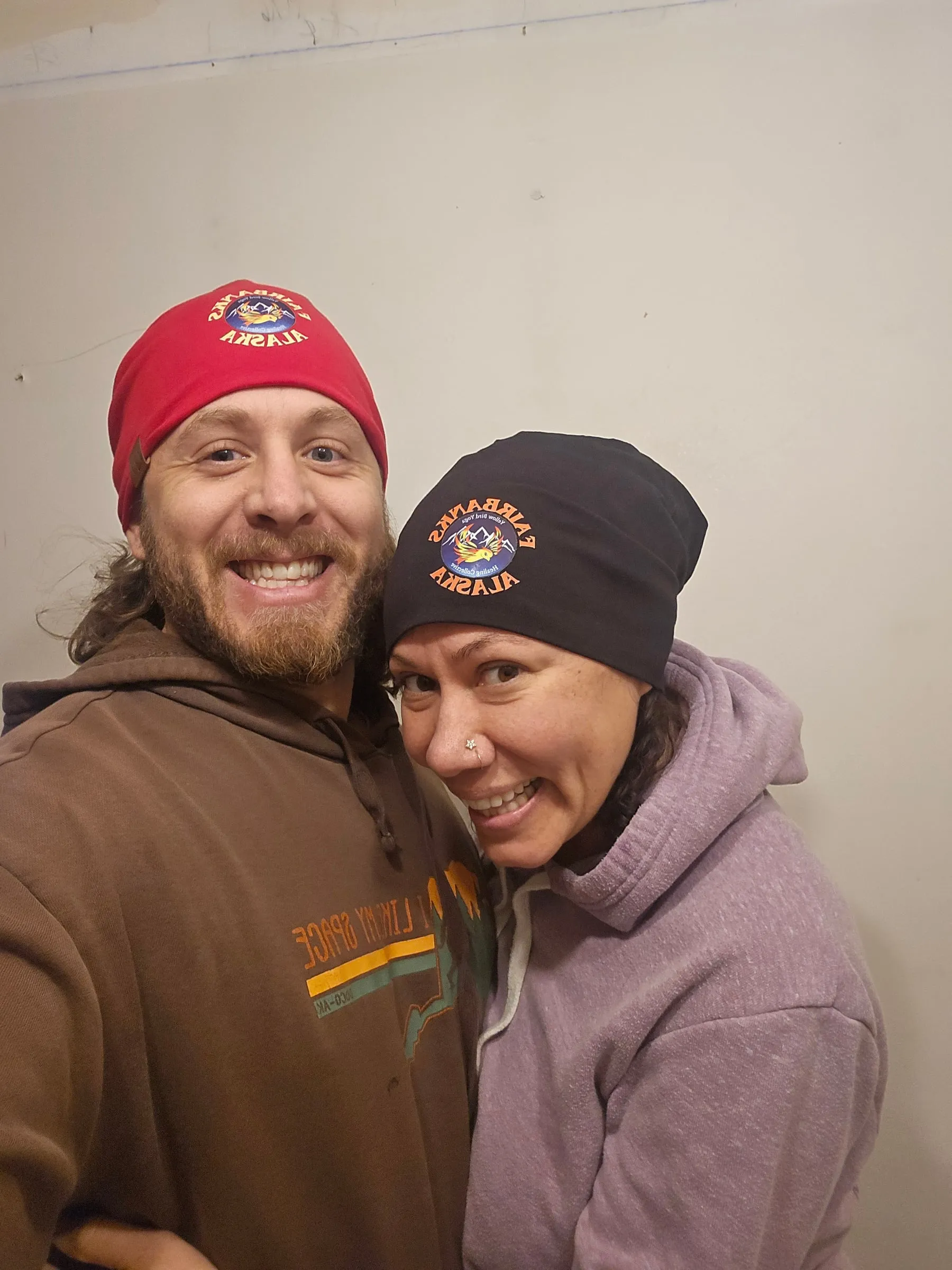 Two friends taking a selfie in the studio